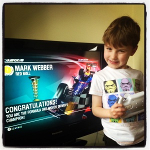 The ecstatic 5 year old having steered Mark Webber to title victory!